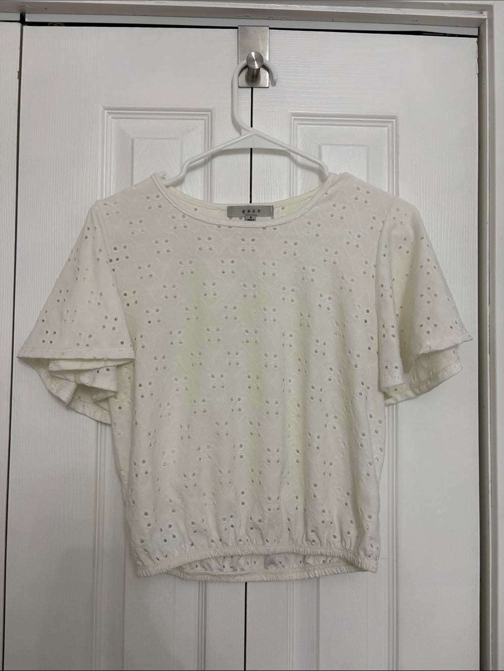 White flowy top